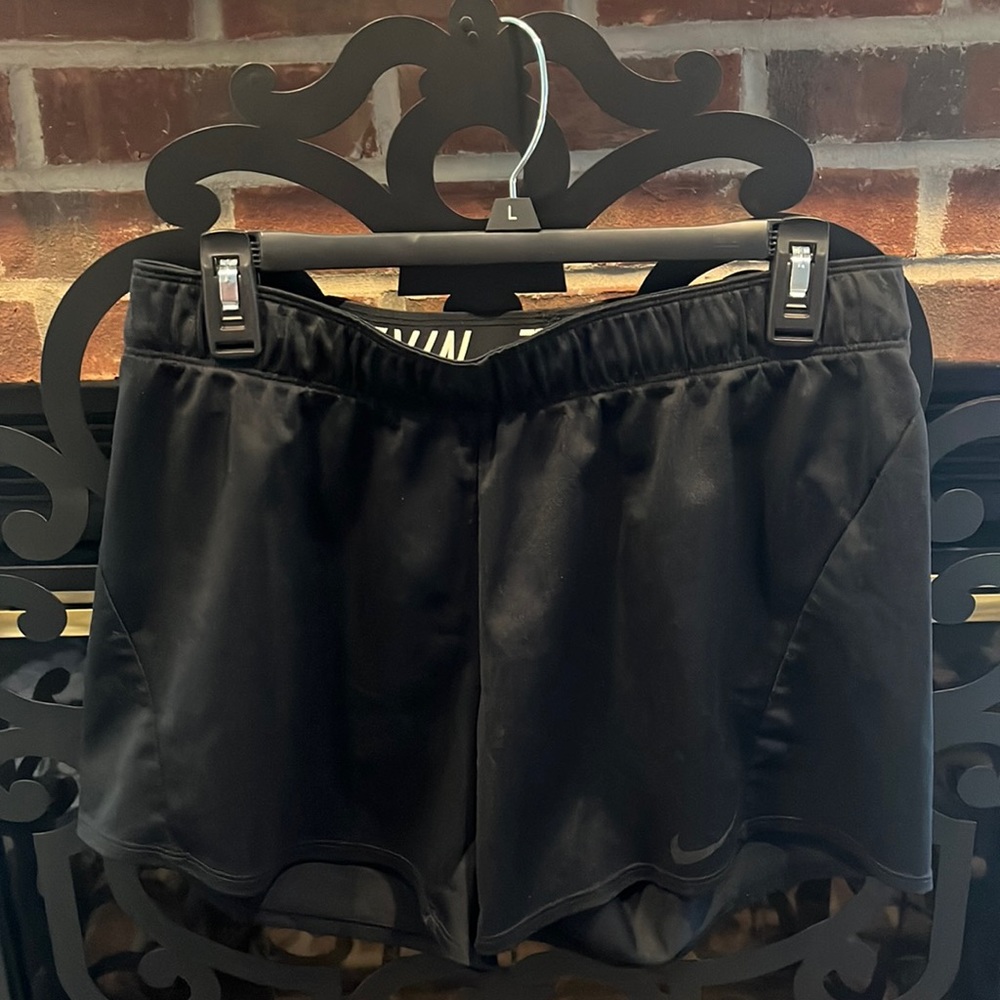 Nike Shorts!Size:M Color:Black with Nike written in white inside.Approx. 14” L